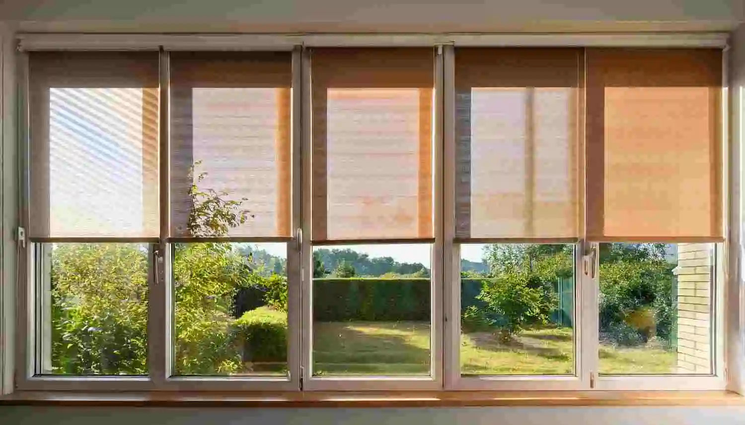 Honeycomb shades installed on windows to reduce heat and sunlight in a Florida home